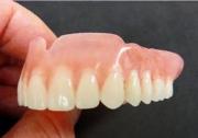как быстрее привыкнуть к съемным зубным протезам