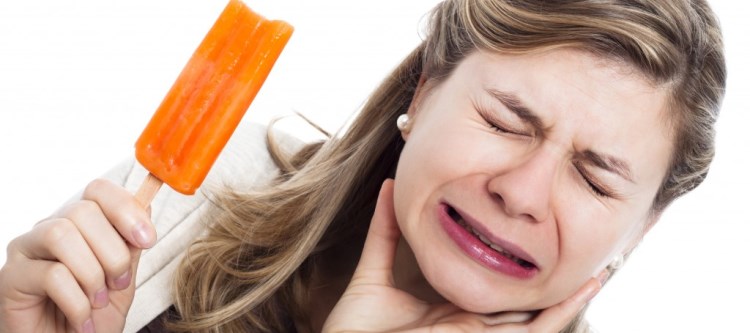 Почему зуб реагирует на холодное и горячее